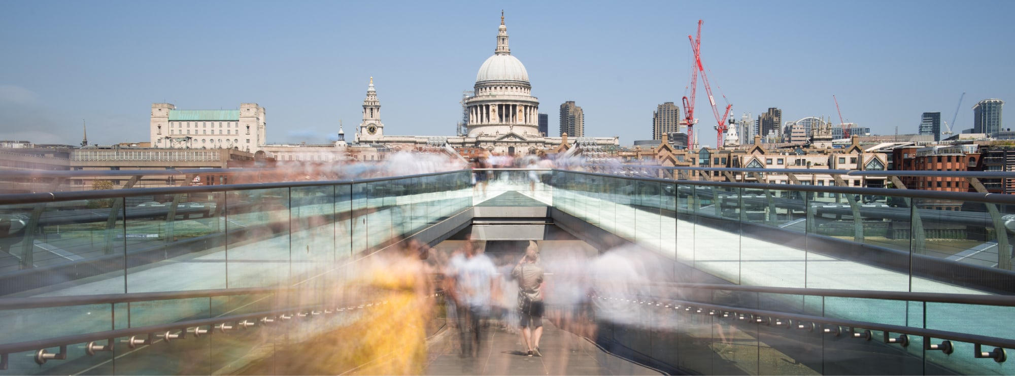 People walking past building in London