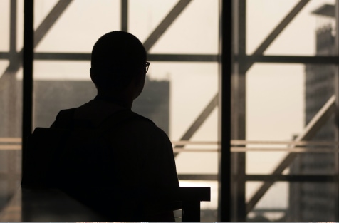 Business man walking down stairs