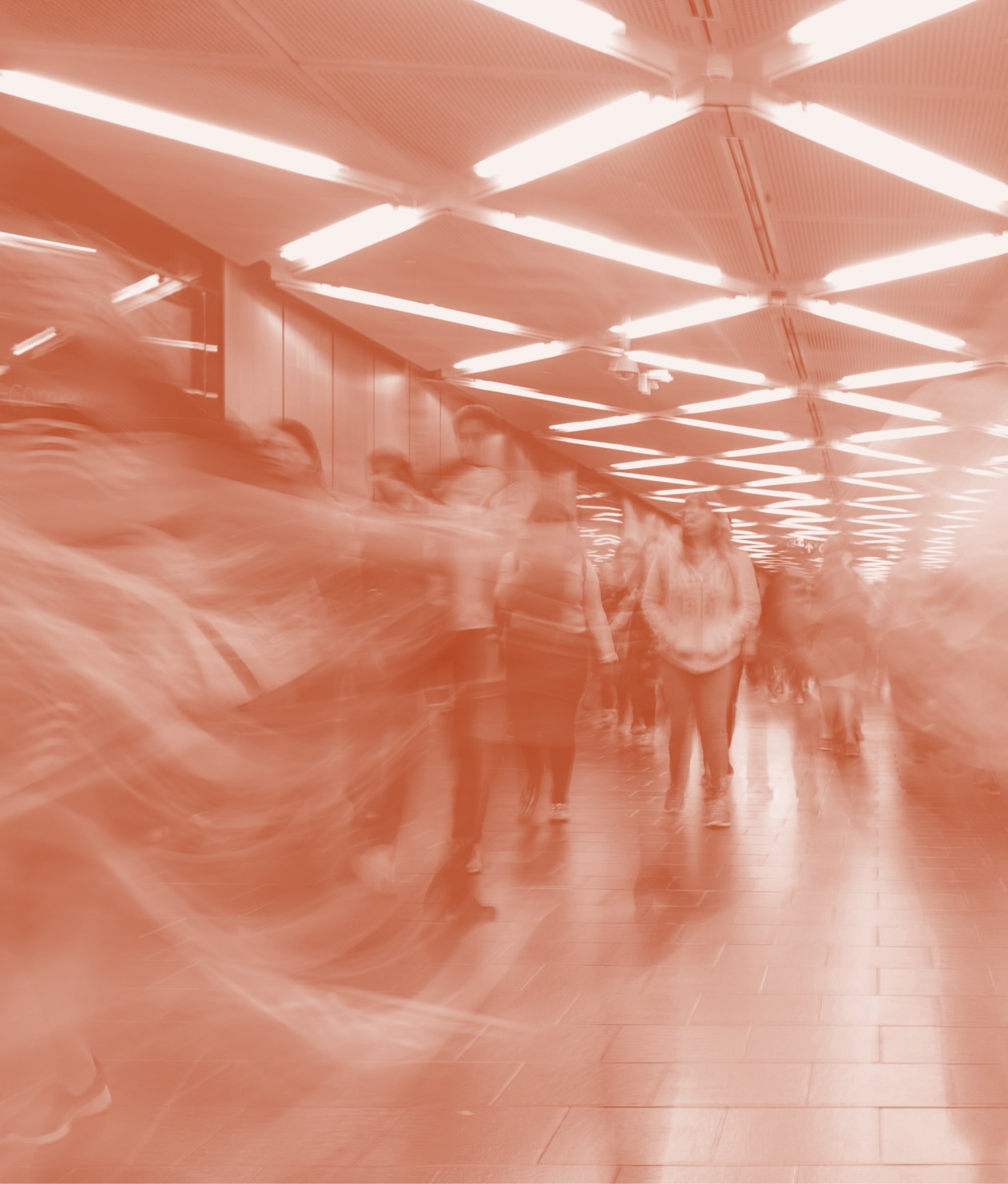 People walking through train station