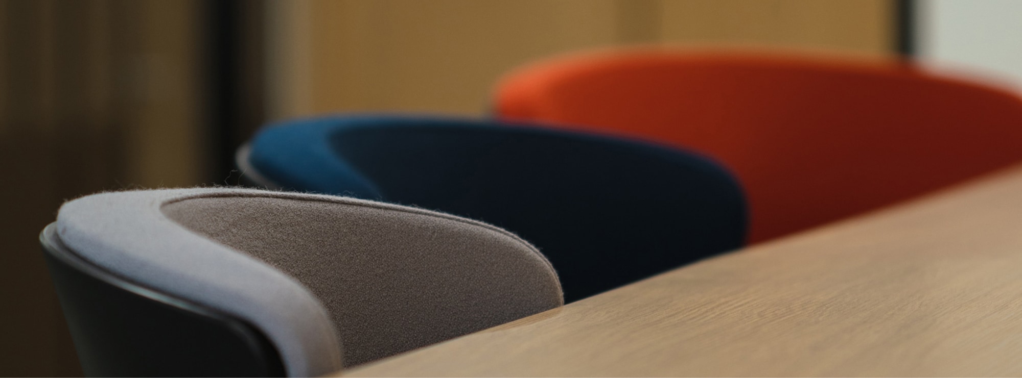 Coloured chairs in meeting room